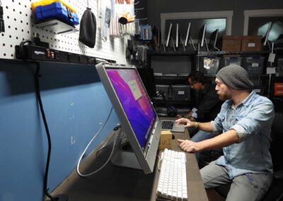 Bassani-Tech-Aaron-sitting-at-desk_5-